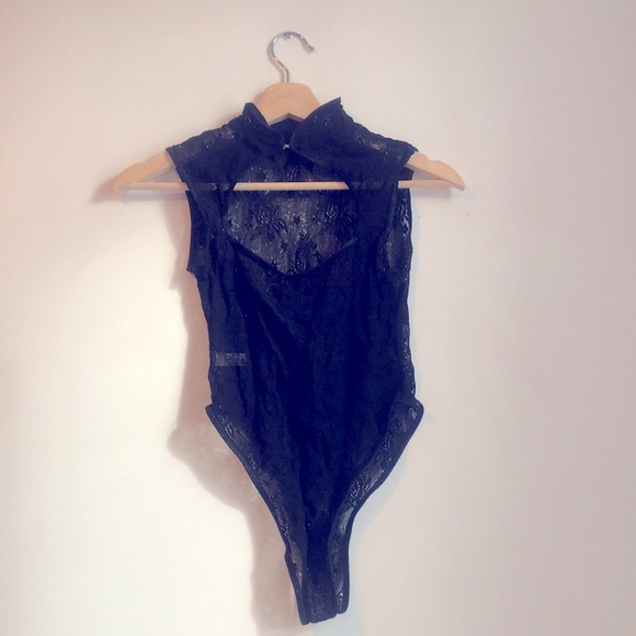 Black lace bodysuit. Size Small to Medium. Height neck. High cut thigh. EUC - Picture 2 of 8